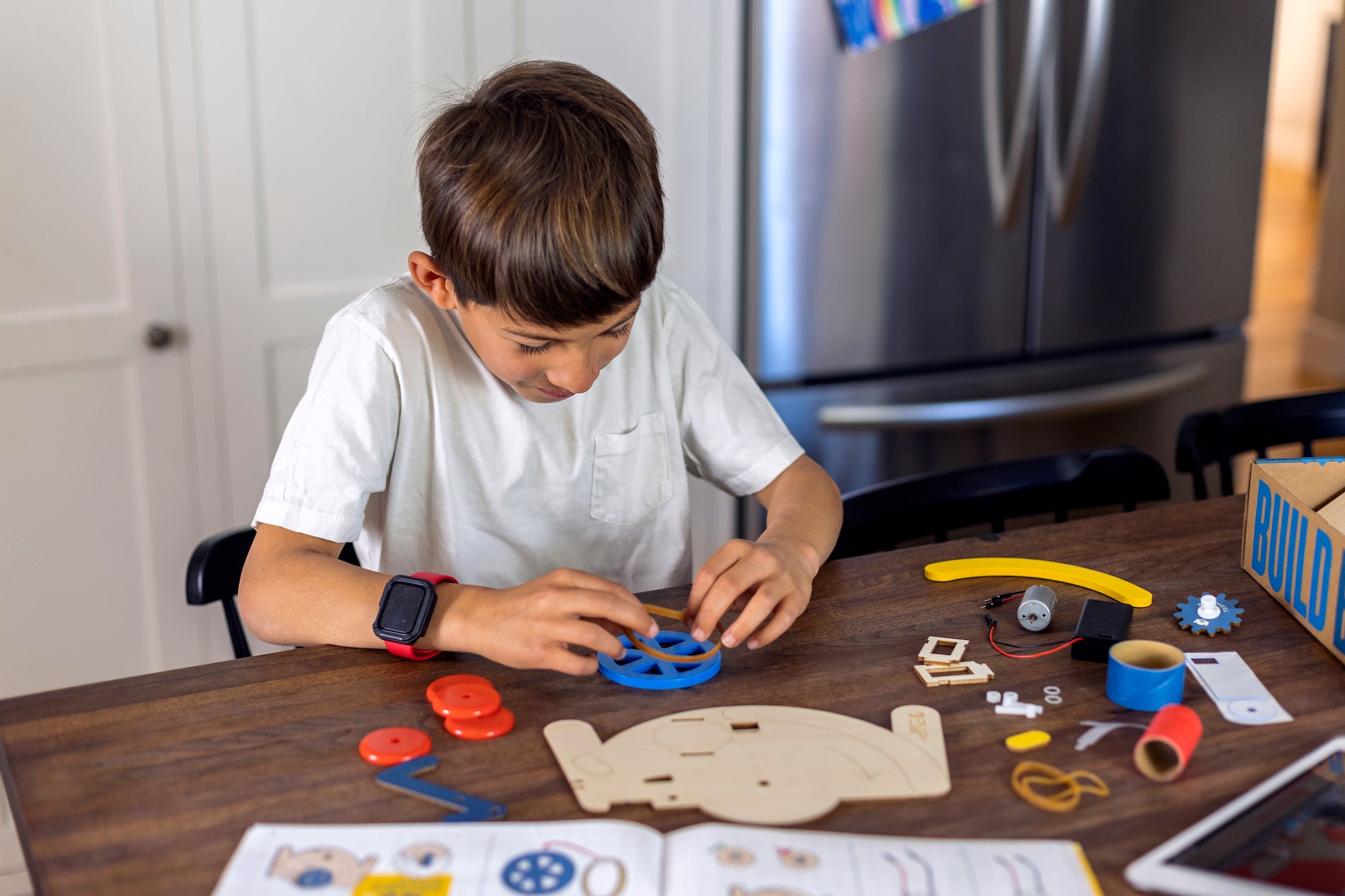 Boy Assembling Build Box